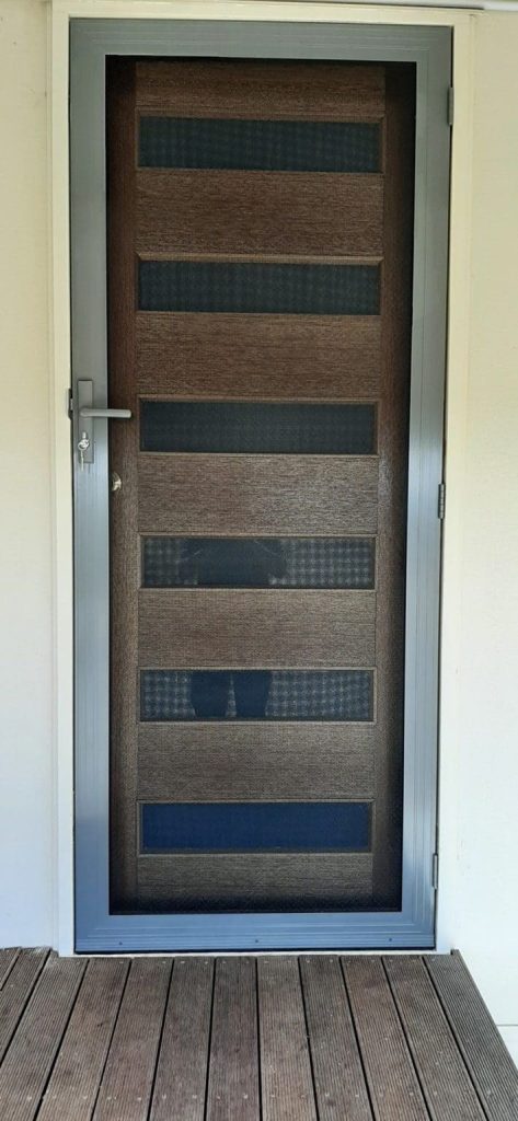 Exterior view of a wooden door with a glass panel, showcasing Knight Shutters and Improvements' security screen doors adelaide.