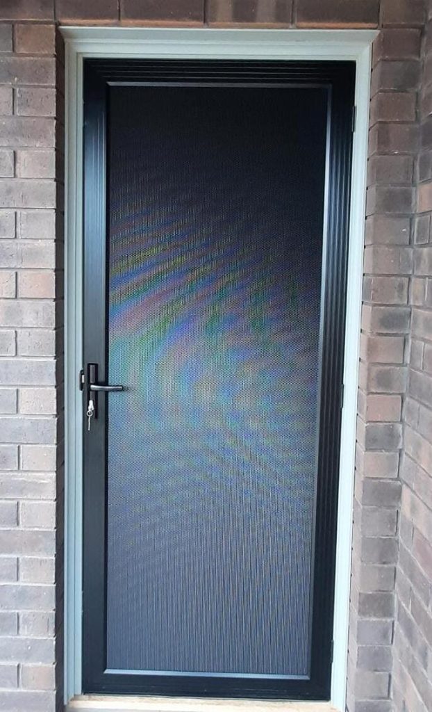 Black door with a window, showcasing Knight Shutters and Improvements' security screen doors adelaide.