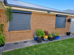Modern home with Roller shutters Gawler on brick exterior windows