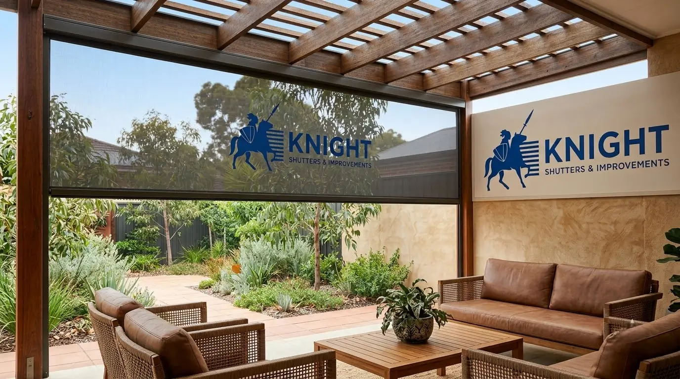 Track-guided outdoor blind partially lowered on an Adelaide alfresco