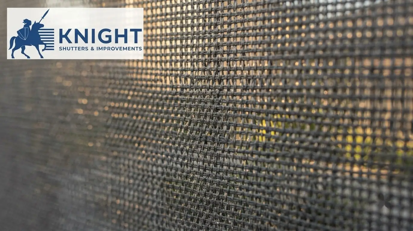 Close-up of external blind fabric weave showing mesh texture