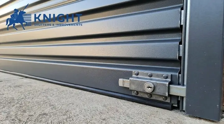 Close-up of a heavy-gauge roller shutter slat and locking mechanism built for security