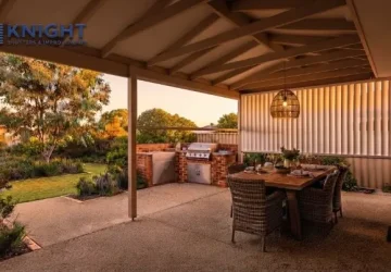 Outdoor blinds lowered on one side of a covered patio in Adelaide