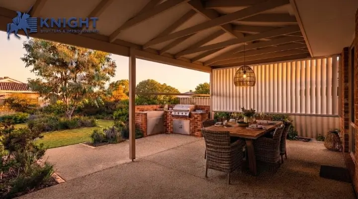 Outdoor blinds lowered on one side of a covered patio in Adelaide