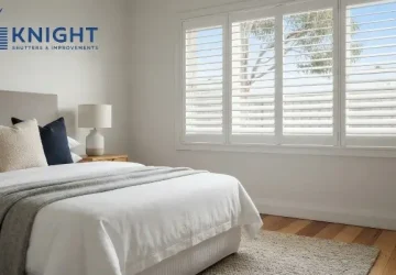 White plantation shutters with louvres partly open in an Adelaide bedroom